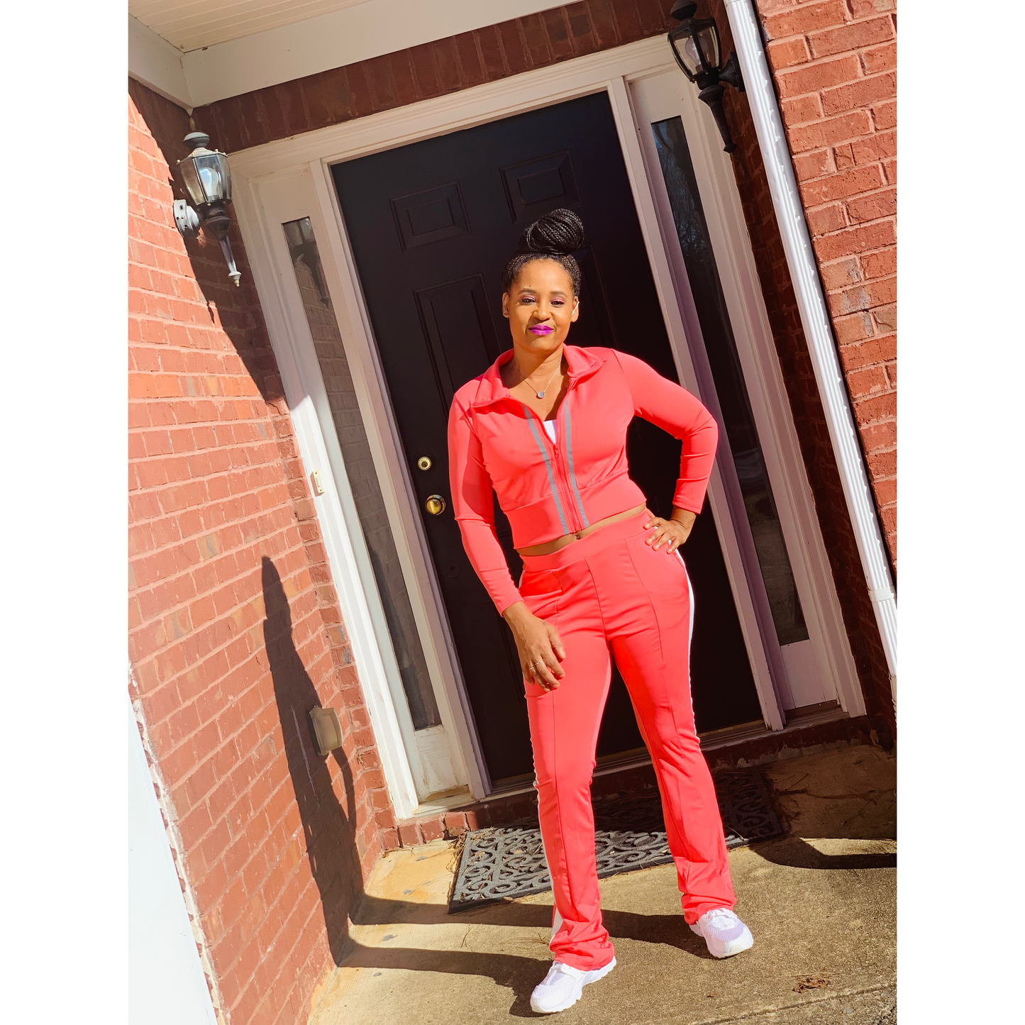 Long sleeve crop jacket and track pants set in pink