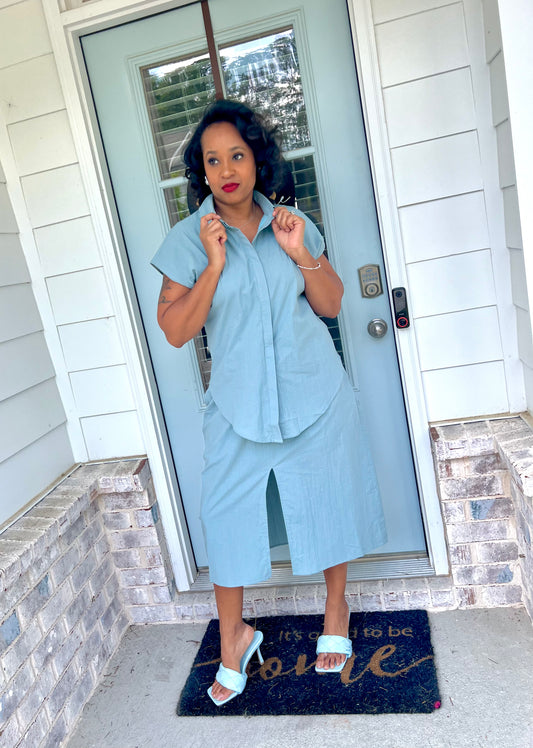 Light blue one piece skirt and short sleeve top