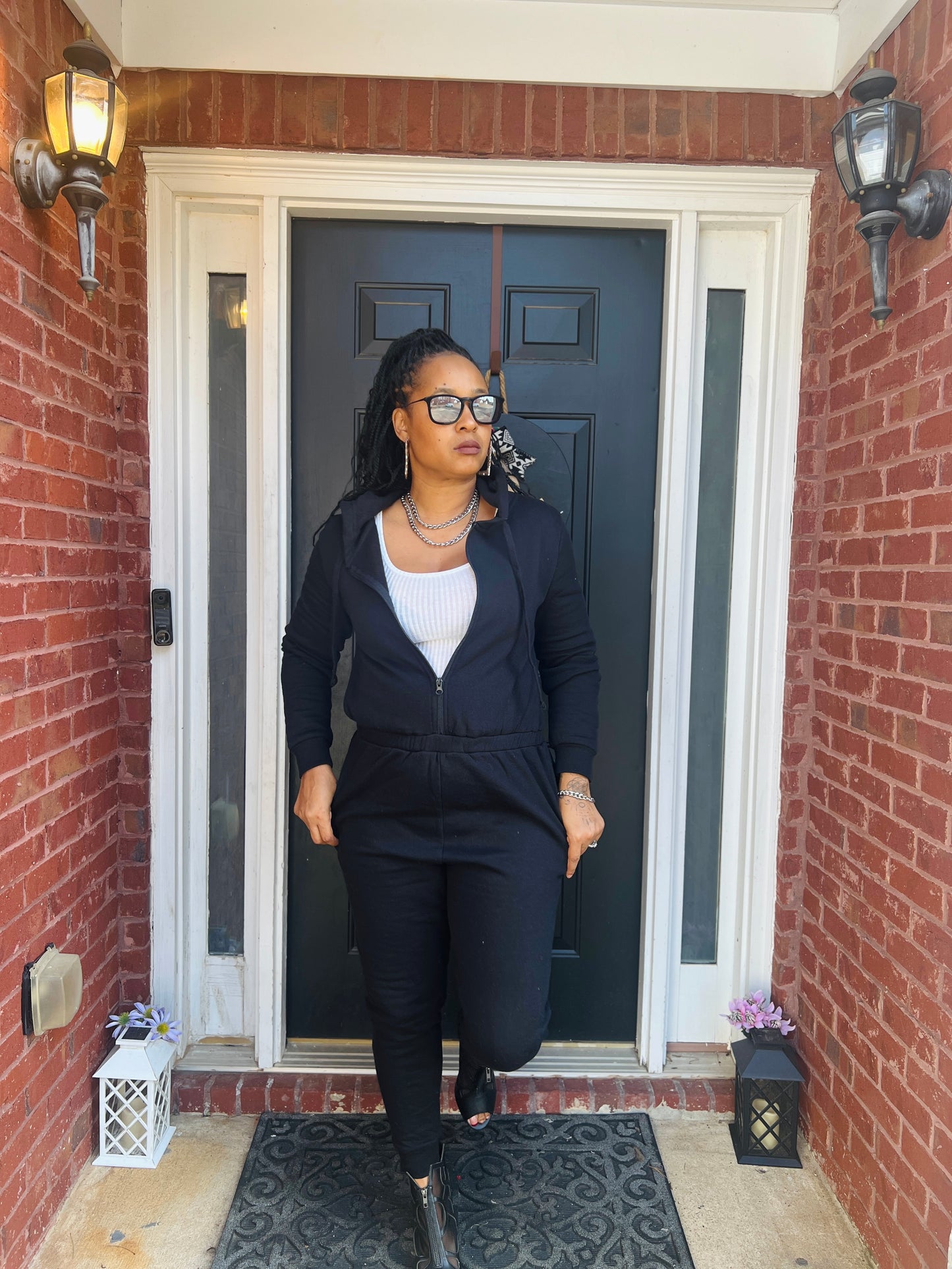 Fleece zip jumpsuit in black with hoodie