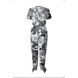 short sleeve leaf print tie bottom jumpsuit in black and white